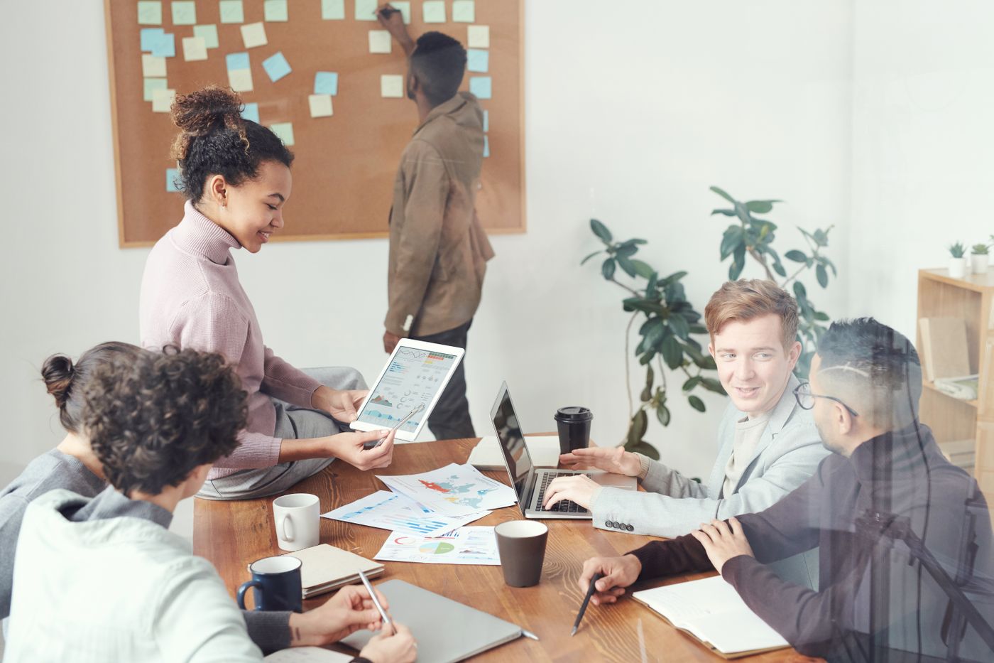 Marketing desk with growth blueprint documents for a regional retailer